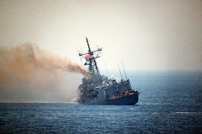 A port quarter view of the guided missile frigate USS STARK (FFG-31) listing to port after being struck by an Iraqi-launched Exocet missile.